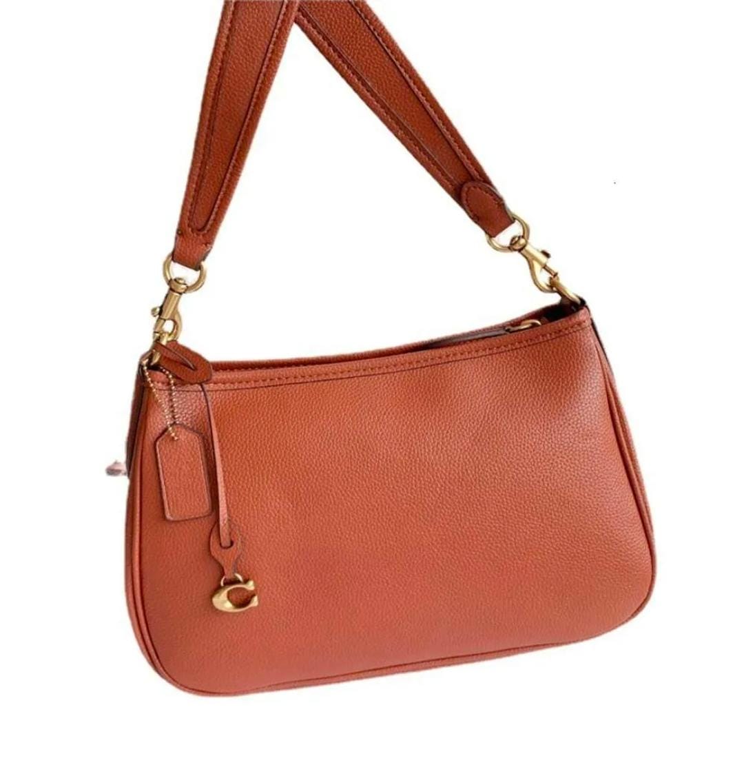 CARRY MEDIUM CROSSBODY BAG